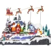 Villaggio Innevato Con Slitte Di Babbo Natale Volante